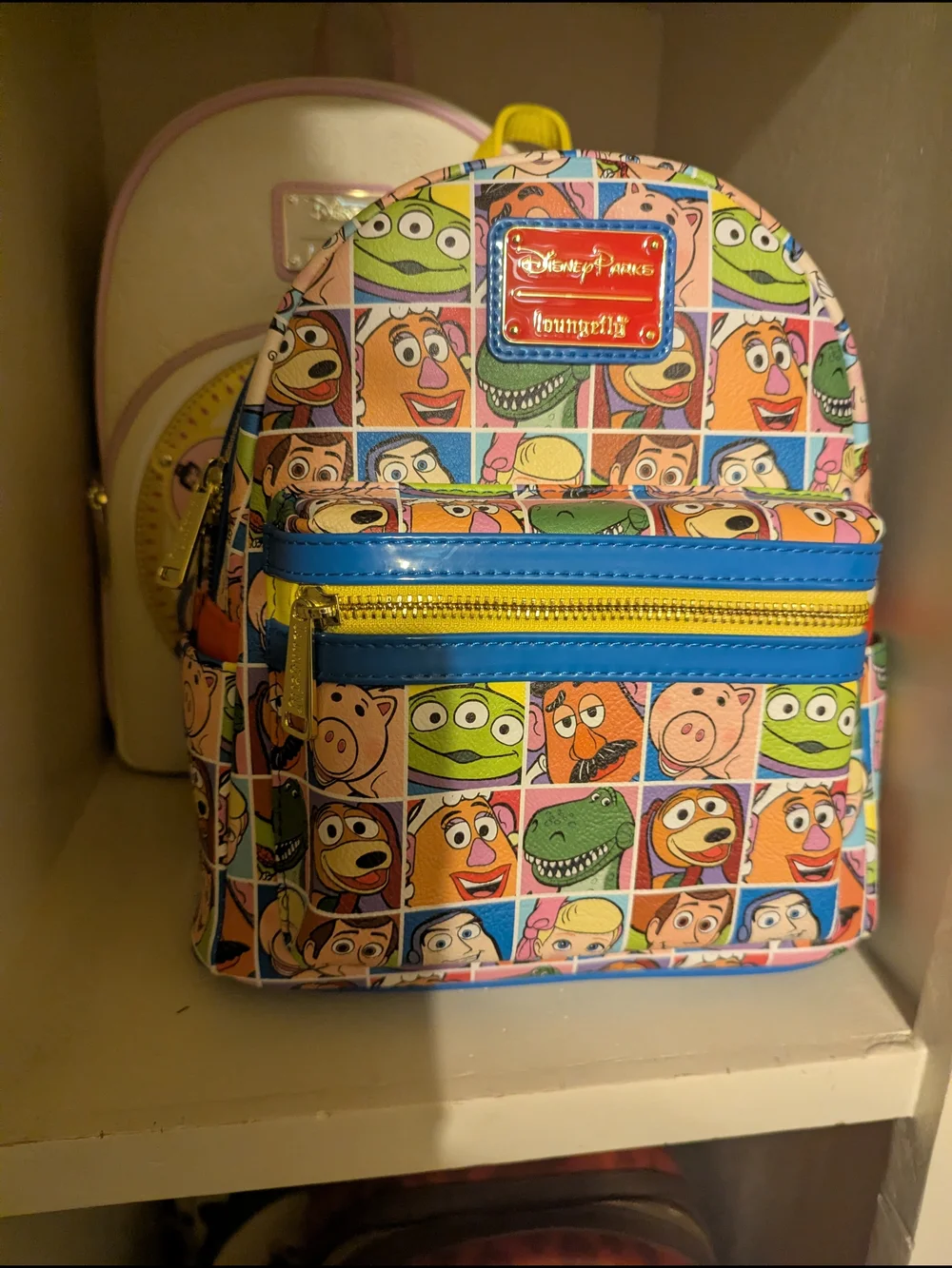 Loungefly Toy Story Character Mini Backpack - Blue, Yellow, Pink